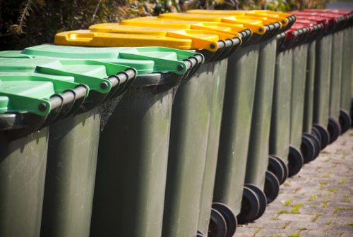 Photograph of commercial waste containers at a collection site in Honor Oak