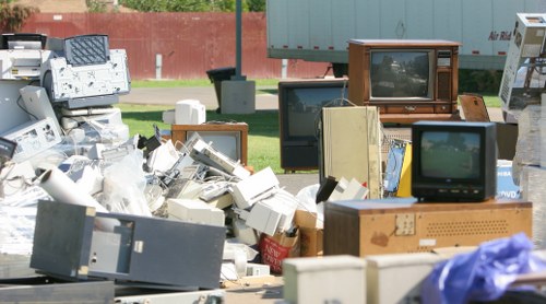 Recycling center processing old furniture